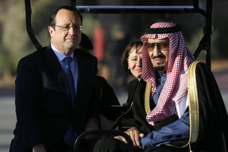 Saudi Arabia's Prince Salman Bin Abdulaziz Al Saoud (R) and French President Francois Hollande (L)