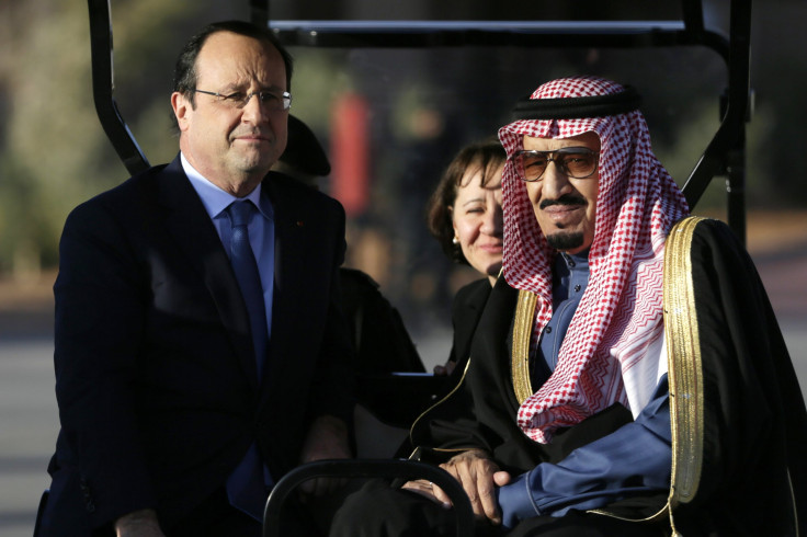 Saudi Arabia's Prince Salman Bin Abdulaziz Al Saoud (R) and French President Francois Hollande (L)