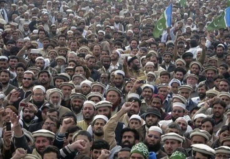 Supporters of the religious and political party Jamaat-e-Islami take part in a protest rally against U.S. citizen 