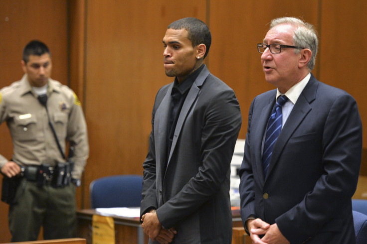 Singer Chris Brown and attorney Mark Geragos (R)
