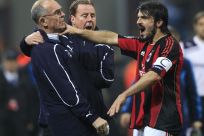 AC Milan's Gattuso argues with Tottenham Hotspur's first team coach Jordan next to manager Redknapp during their Champions League soccer match in Milan.