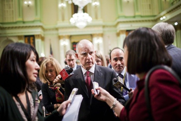 California Governor Jerry Brown speaks to reporters after delivering the State of the State address in Sacramento