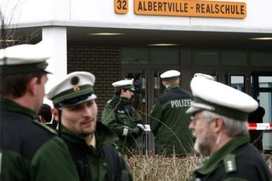 Police guard the Albertville-Realschule school where a shooting incident took place in Winnenden March 12, 2009