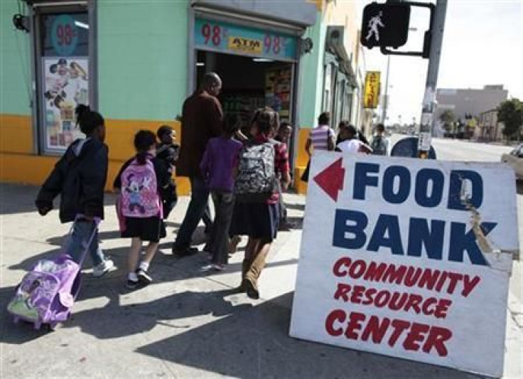 Regional coordinator Charles Evans (4th L) picks up children from school to take them to an after-school program at South Los Angeles Learning Center in Los Angeles, Californi