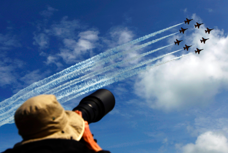 Photographer takes a shot of Republic of Korea Air Force Black Eagles