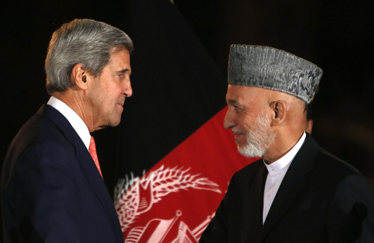 John Kerry and Hamid Karzai