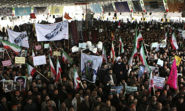 People take part in the funeral of Sanee Zhaleh, a student who was shot dead during an opposition rally on Monday, in Tehran