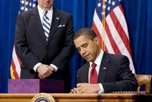 U.S. President Barack Obama signs stimulus package bill at the Denver Museum of Nature and Science