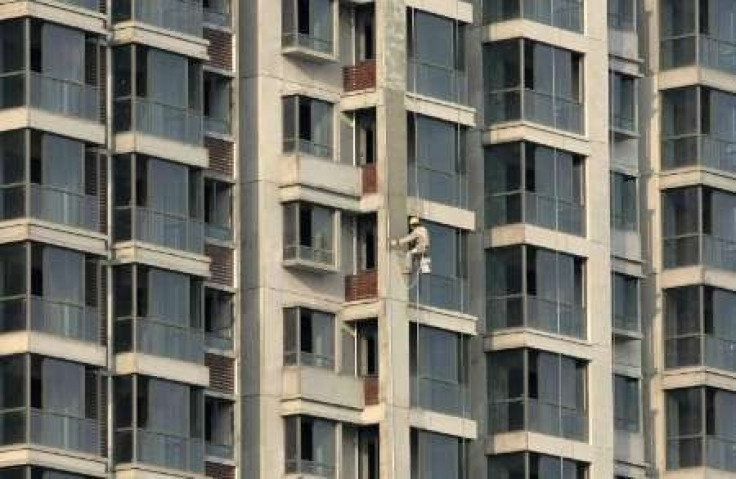 China tightening to hit small property firms -Fitch