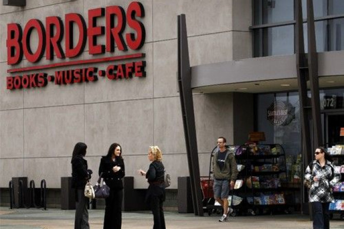 People talk outside a Borders bookstore in San Diego, California February 16, 2011