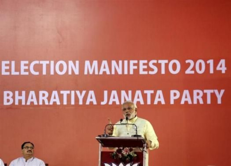 Hindu nationalist Narendra Modi, the prime ministerial candidate for Bharatiya Janata Party (BJP), addresses a gathering after releasing their election manifesto in New Delhi April 7, 2014. 