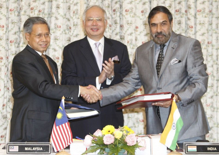 Malaysia and India, two of emerging Asia's robust economies, signed a Comprehensive Economic Cooperation Agreement (CECA) on Friday, aiming to boost bilateral trade to the tune of $15 billion by 2015.