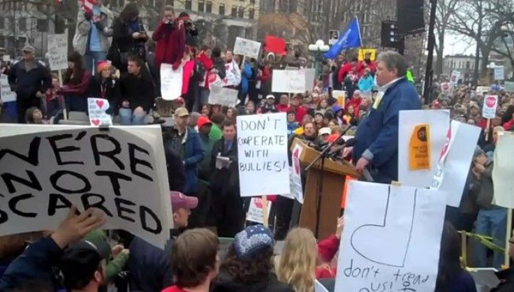 In a screen grab from video provided on the Wisconsin Education Association Council’s website, protesters in Madison, Wisconsin, rally on February 17, 2011 against a bill that would eliminate some collective bargaining abilities for state workers.
