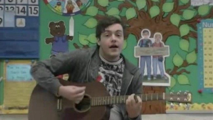In a screen grab from a YouTube.com video, Evan Emory, 21, is shown singing in a classroom in Muskegon, Michigan, located in the eastern part of the state.