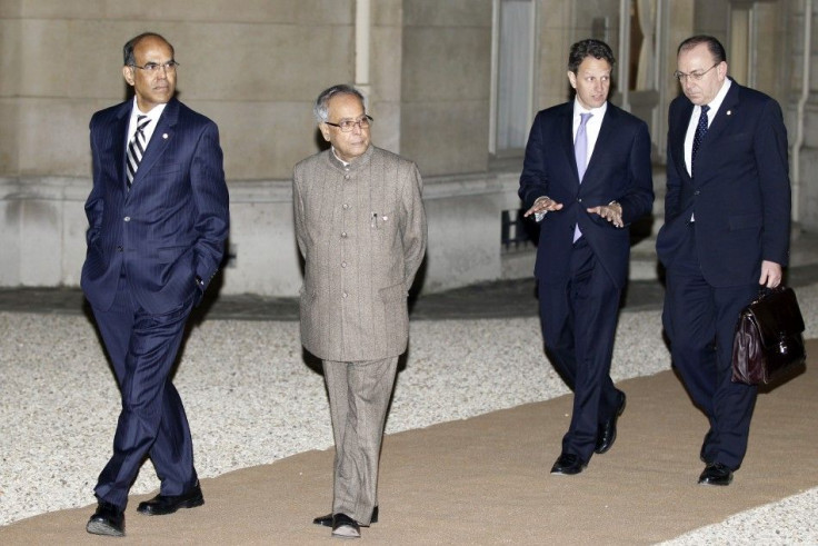 India's Central Bank Governor Subbarao , India's Finance Minister Mukherjee, U.S. Treasury Secretary Geithner and Bundesbank President Weber arrive at the Hotel Marigny to attend the dinner of G20 finance ministers and central bank governors in Paris