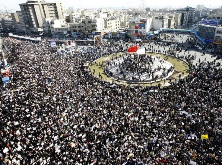 Iranians attend a pro-government rally following Friday prayers in Tehran February 18, 2011. 