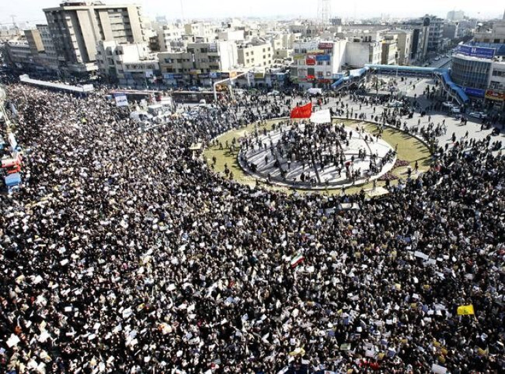 Iranians attend a pro-government rally following Friday prayers in Tehran February 18, 2011.