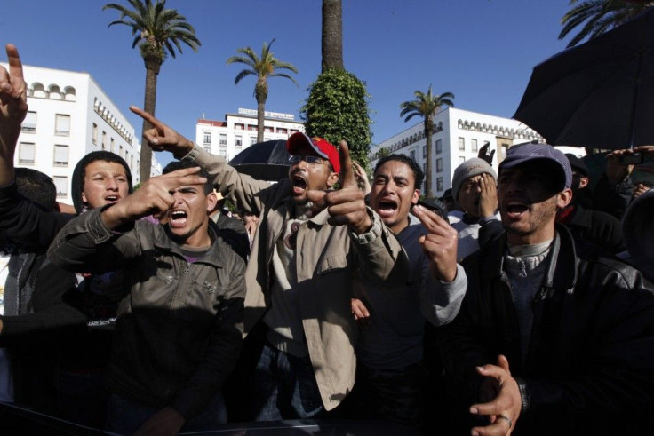 People chant slogans during a protest in Rabat 