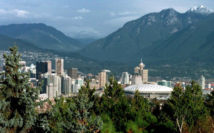 The dwarfed Vancouver skyline  