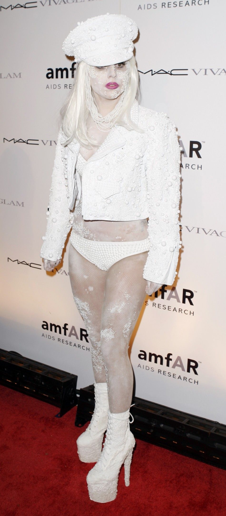 Singer Lady Gaga arrives for the amFAR The Foundation for AIDS Research annual gala to kick off Fashion Week in New York February 10, 2010 