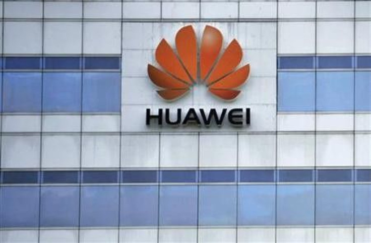 China decries U.S. &quot;obstruction&quot; after Huawei drops bid