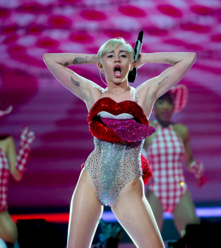 Miley Cyrus 'Frees The Nipple,' Again, In Topless Photo After New Tattoo
