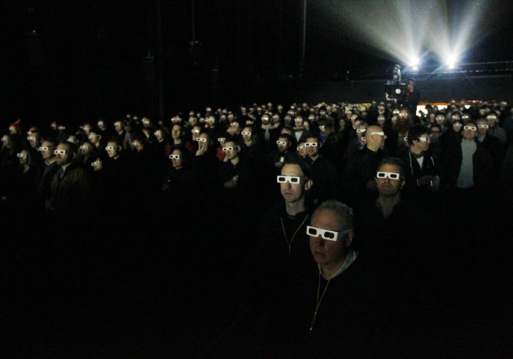 Audience wearing 3D glasses watches a Kraftwerk show