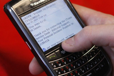 A BlackBerry smartphone user is pictured checking email in Washington