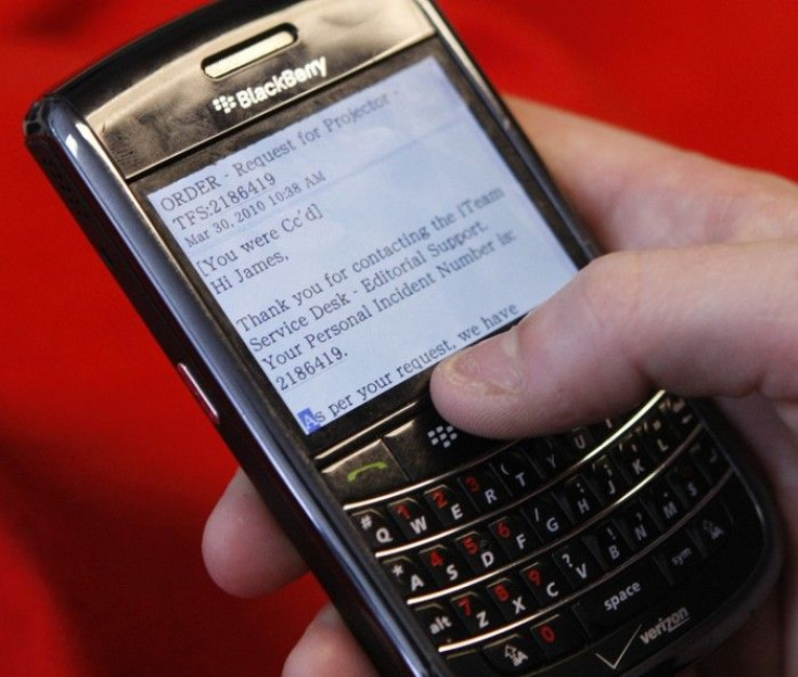 A BlackBerry smartphone user is pictured checking email in Washington
