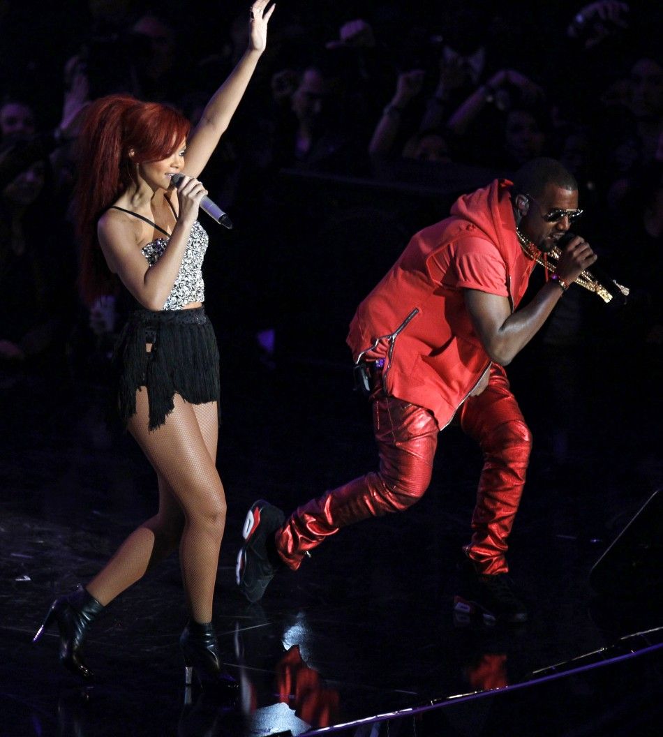 Singers Rihanna and Kanye West perform during the half-time of the NBA All-Star basketball game in Los Angeles