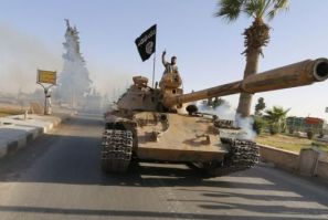 Islamist fighters on tank