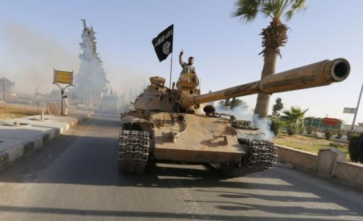 Islamist fighters on tank