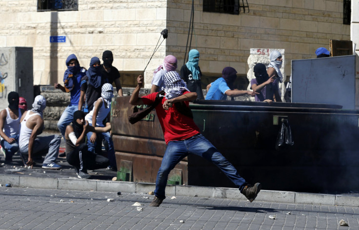 Palestinian youth rock thrower