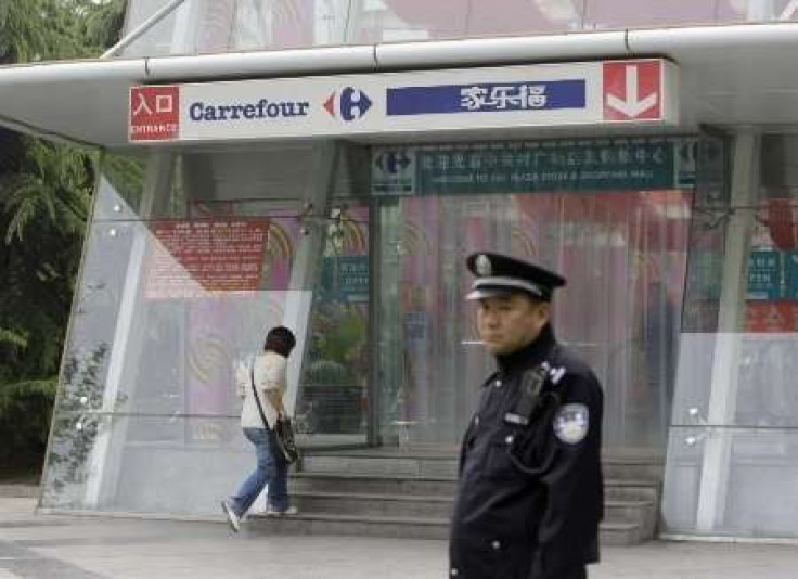 China fines Carrefour, Wal-Mart a combined $1.5 mln