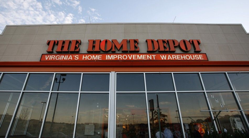 Home Depot tops estimates, raises outlook