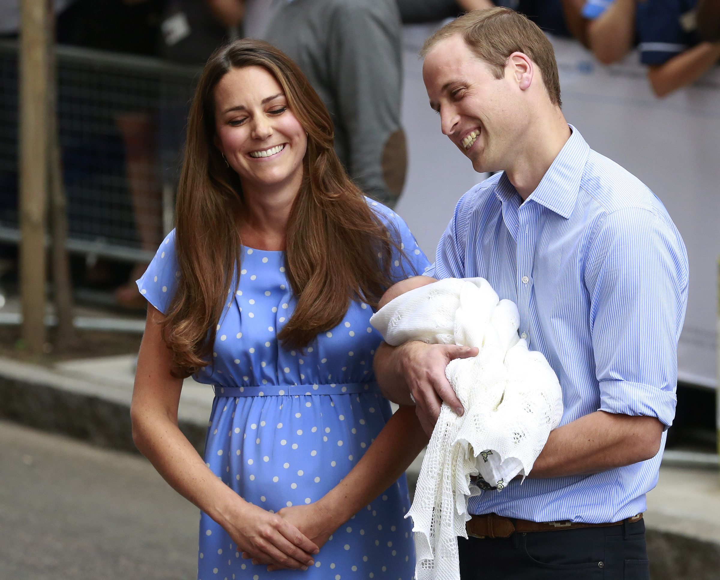 Prince William holding Prince George