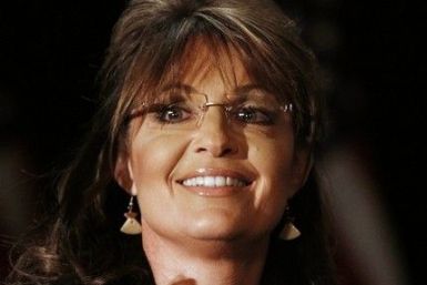 Former Alaska governor Sarah Palin sits before speaking to the LIA (Long Island Association) Annual Meeting & Luncheon at the Crest Hollow Country Club in Woodbury, New York February 17, 2011. 