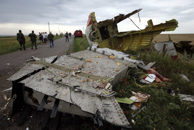 2014-07-17T181921Z_2062382905_GM1EA7I06BM01_RTRMADP_3_UKRAINE-CRISIS-AIRPLANE-TOLL