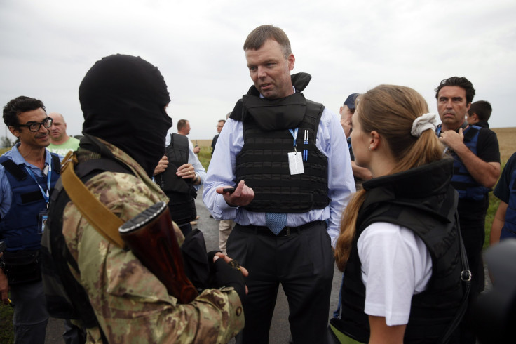 2014-07-18T172424Z_1916478249_GM1EA7J03SU01_RTRMADP_3_UKRAINE-CRISIS-OSCE-MONITORS