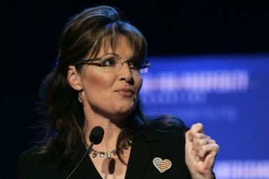 Former Alaska Governor and 2008 Republican Vice Presidential candidate Sarah Palin addresses the audience during the 'Americans For Prosperity Foundation Summit' in Clarkston, Michigan May 1, 2010.