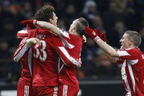 Bayern Munich's Gomez celebrates with his teammates after scoring against Inter Milan during their Champions League soccer match at the San Siro stadium in Milan.