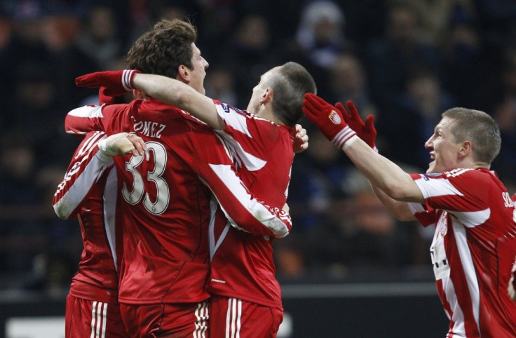 Bayern Munich's Gomez celebrates with his teammates after scoring against Inter Milan during their Champions League soccer match at the San Siro stadium in Milan.