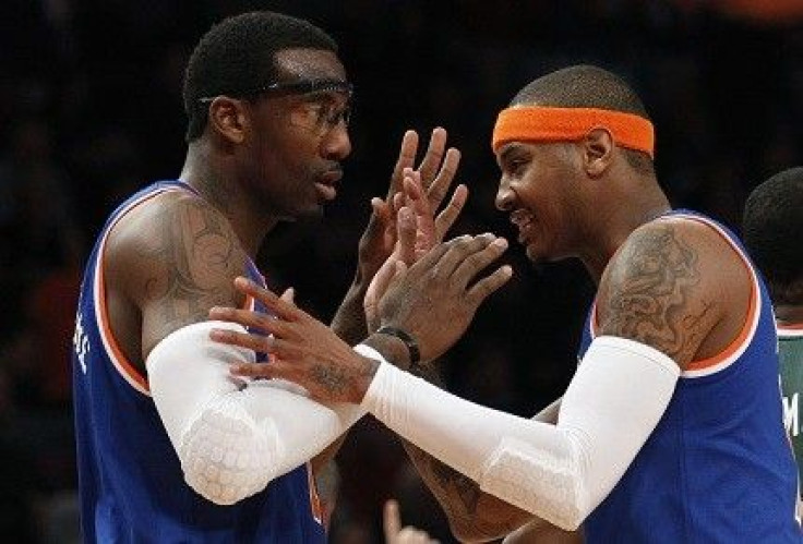 Amare Stoudemire is joined by Carmelo with the Knicks