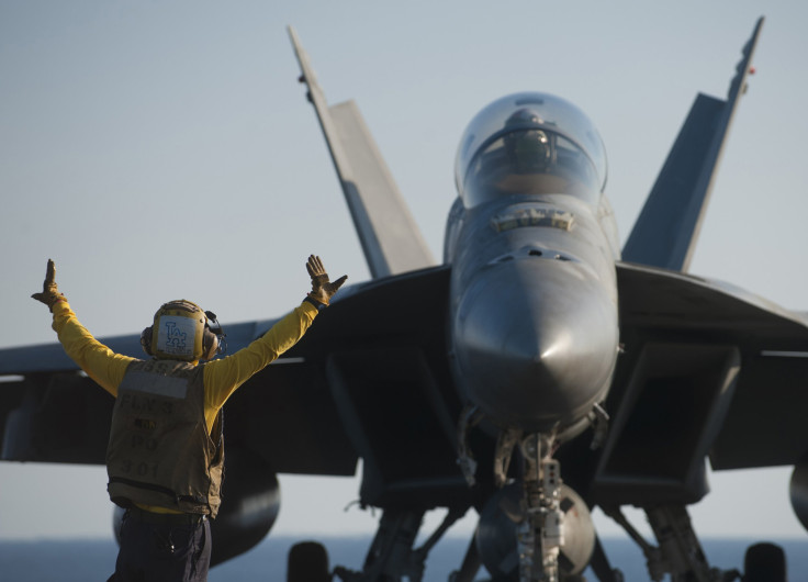 F/A-18 being instructed by ground crew