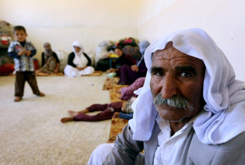 yazidi-families-are-fleeing-bloodshed-violence-northern-iraqi-town-sinjar