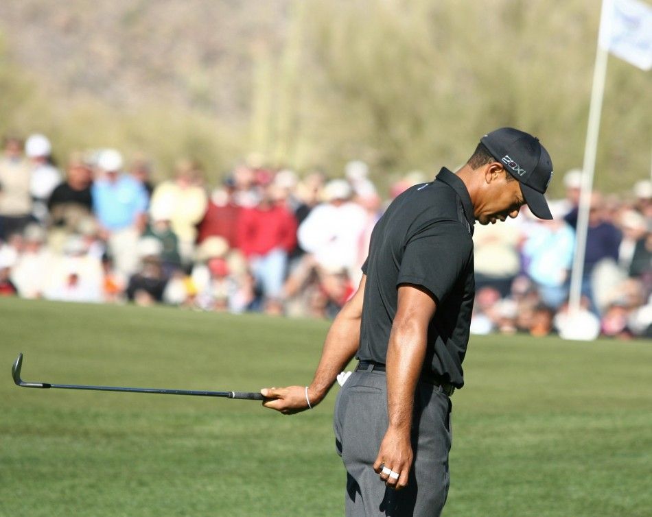 Tiger Woods spits in disgust