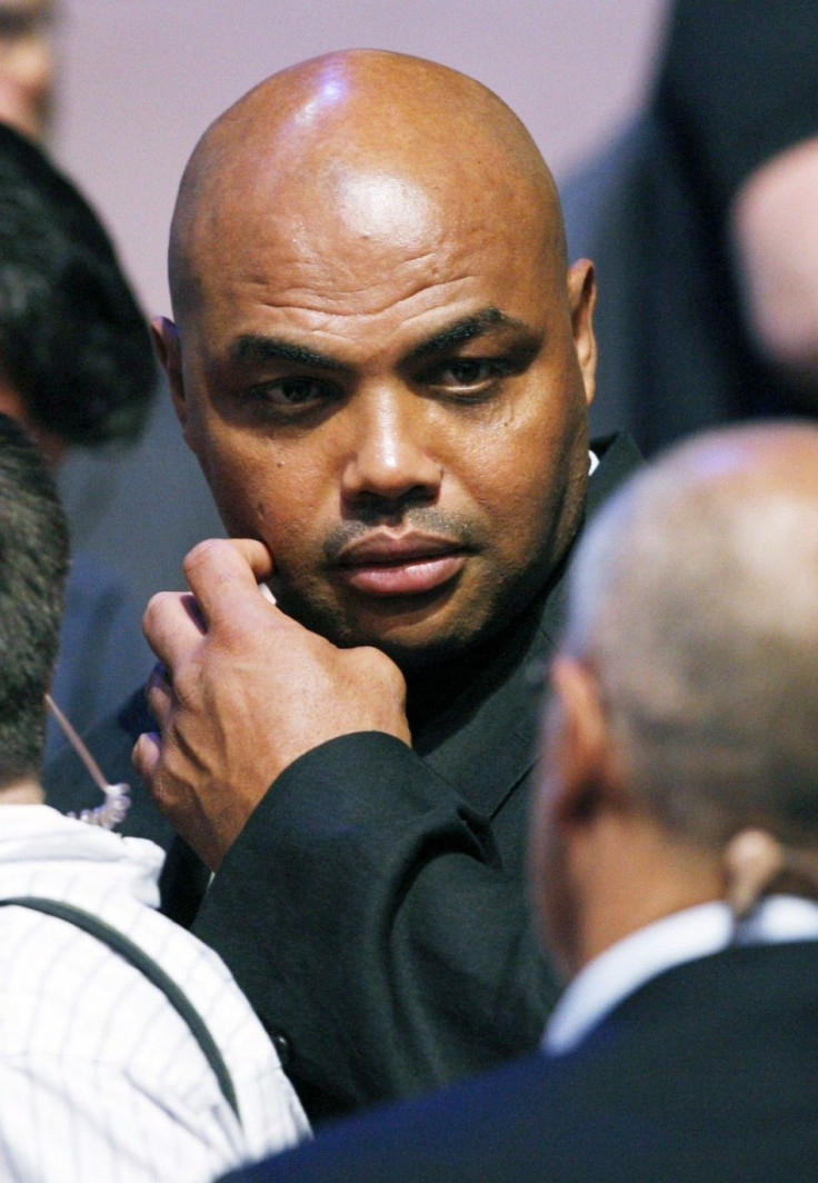 Charles Barkley misses target and spits on young girl 