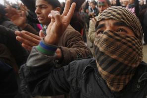 Anti-Gaddafi protesters shout slogans during a protest in Benghazi