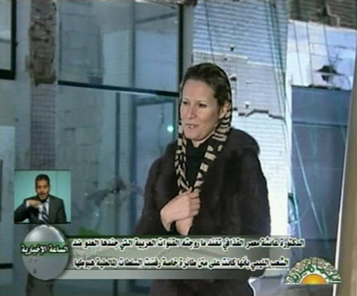 Libyan leader Muammar Gaddafi's daughter Aisha speaks during an interview on state television, in this still image taken from video