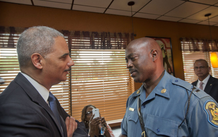Eric Holder with police captain